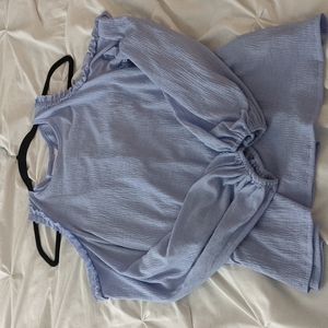 Exposed shoulders flowy, long sleeved blouse